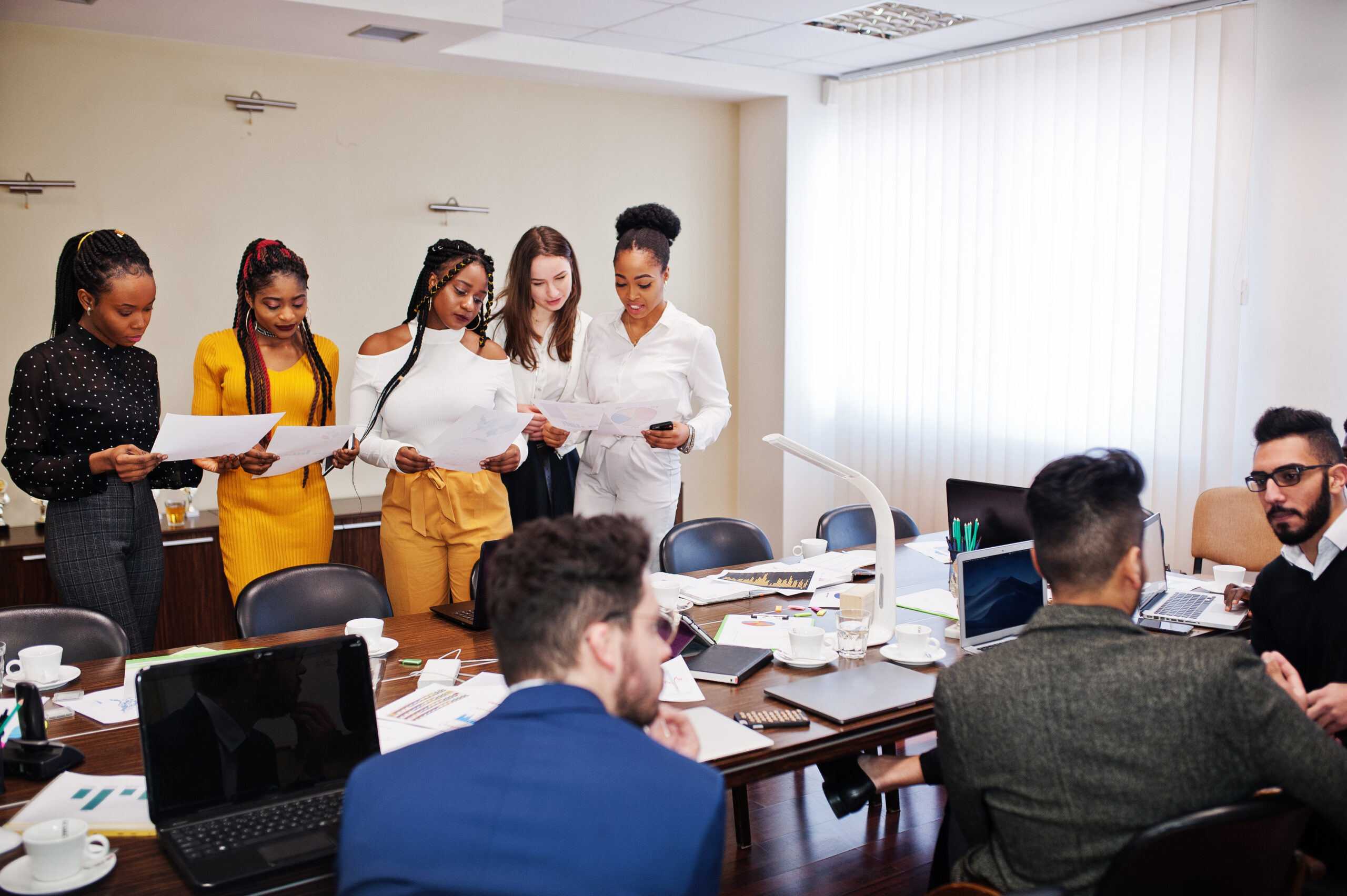 Diverse business people on a meeting at round table.